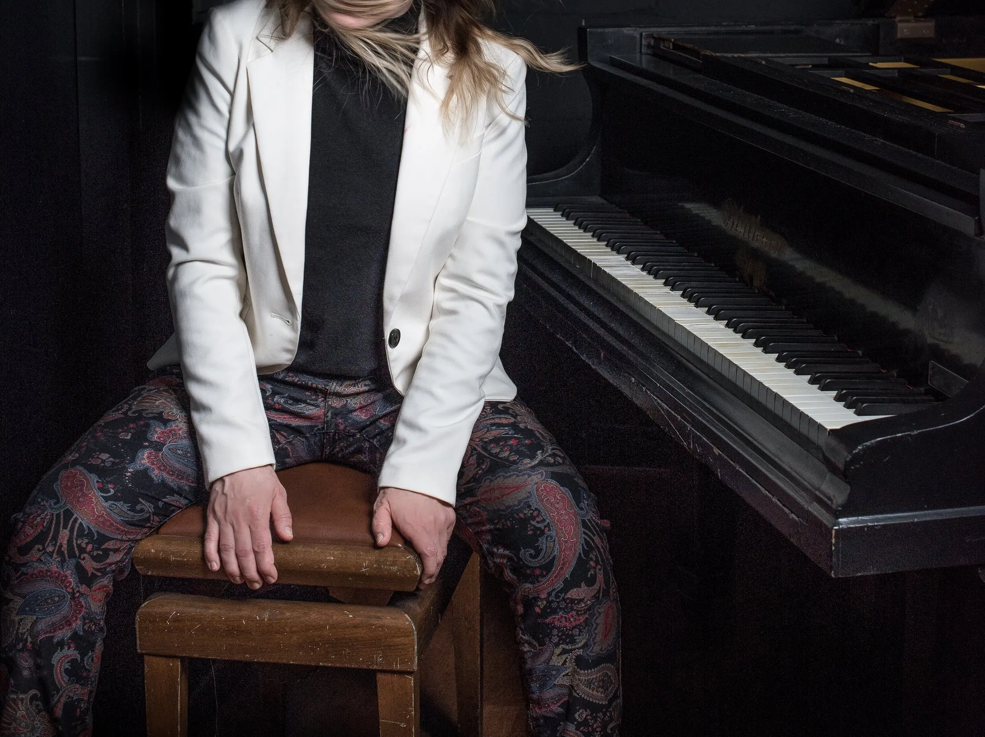 At the piano, wide